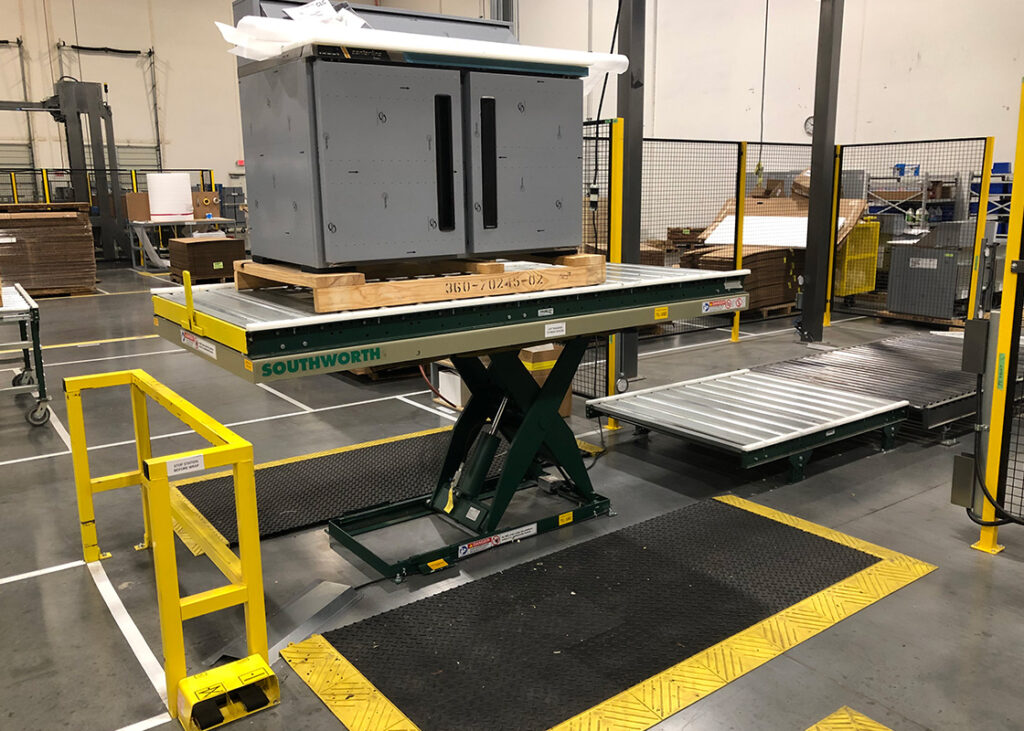 Backsaver Lift Table with conveyor for product assembly